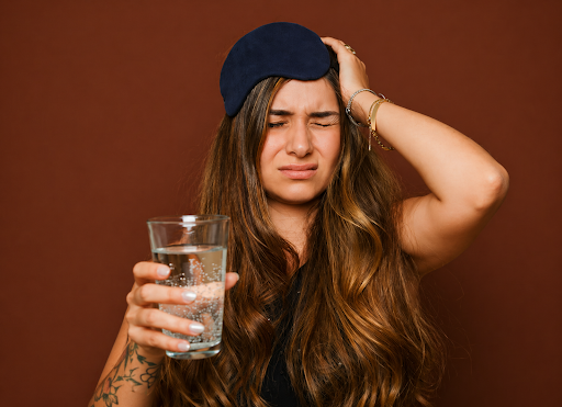 Person experiencing a mild hangover after consuming edibles.