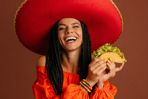 Person trying a weed taco recipe before getting THC edibles.